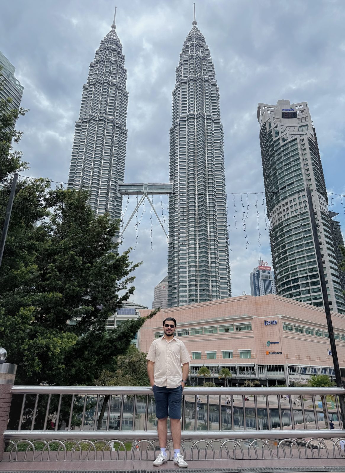 Faiq in front of the Petronas Twin Towers